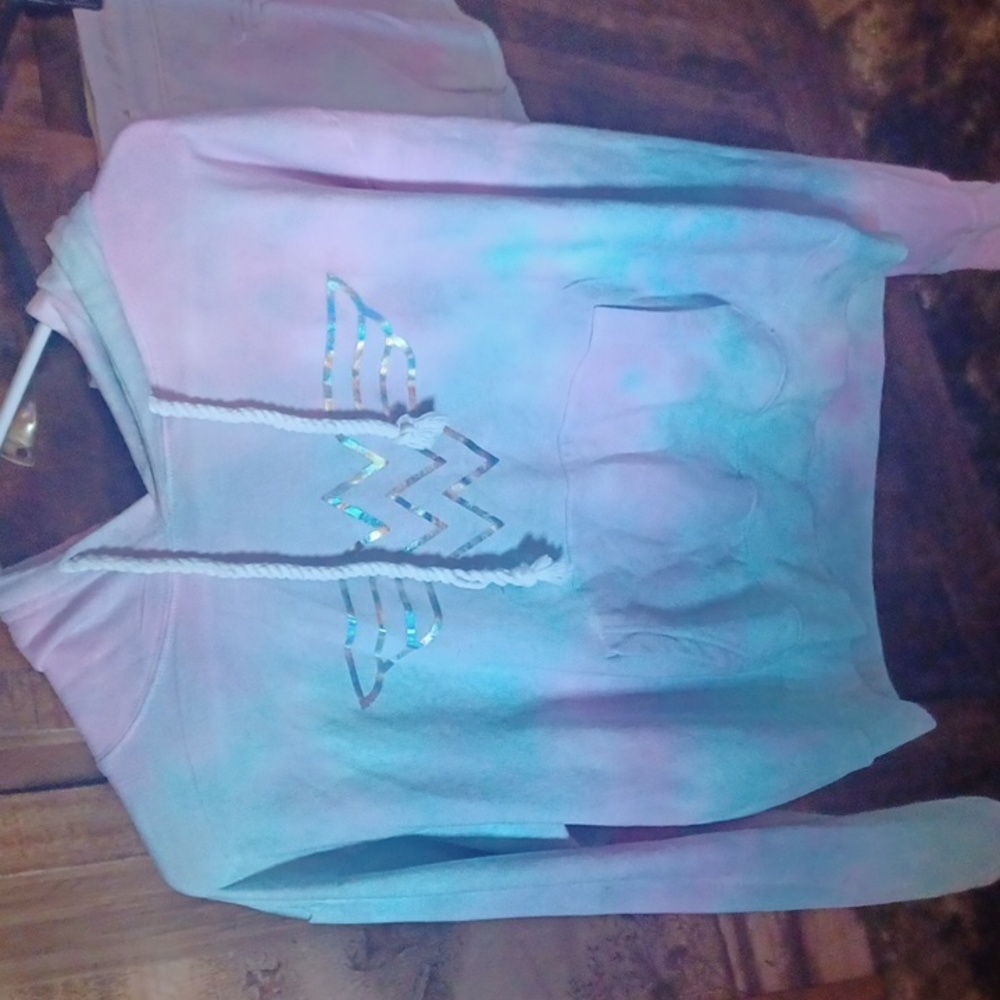 WONDER WOMAN SHORTS AND HOODY TRACK SET. HOODY IS LARGE AND SHORTS MEDIUM.
